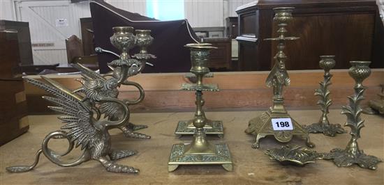 Collection of brass candlesticks